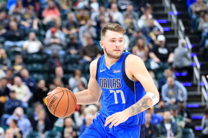 INDIANAPOLIS, IN - JANUARY 19:  Luka Doncic #77 of the Dallas Mavericks  dribbles the ball...
