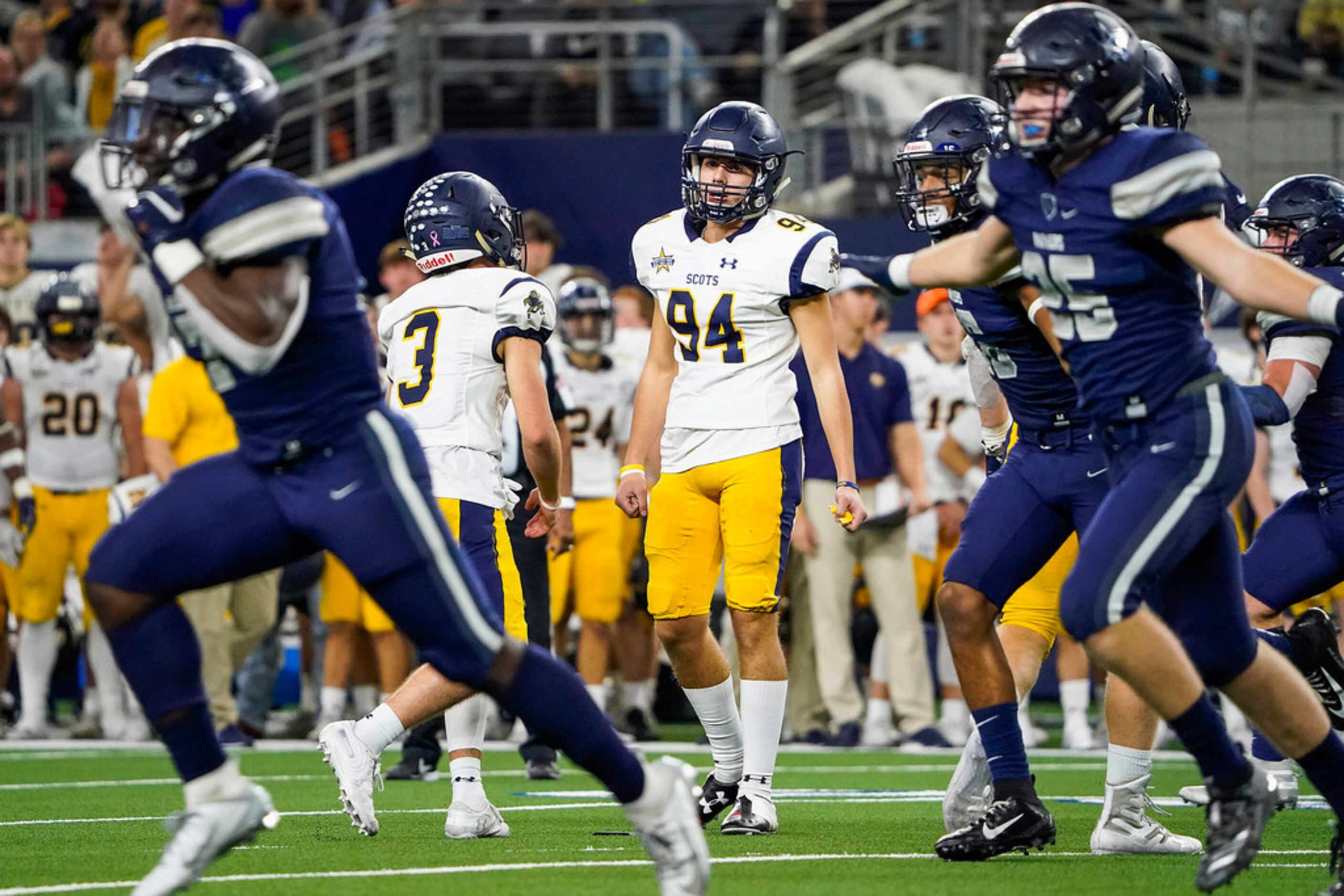 Highland Park kicker Wesley Winters reacts after missing a field goal attempt in overtime of...