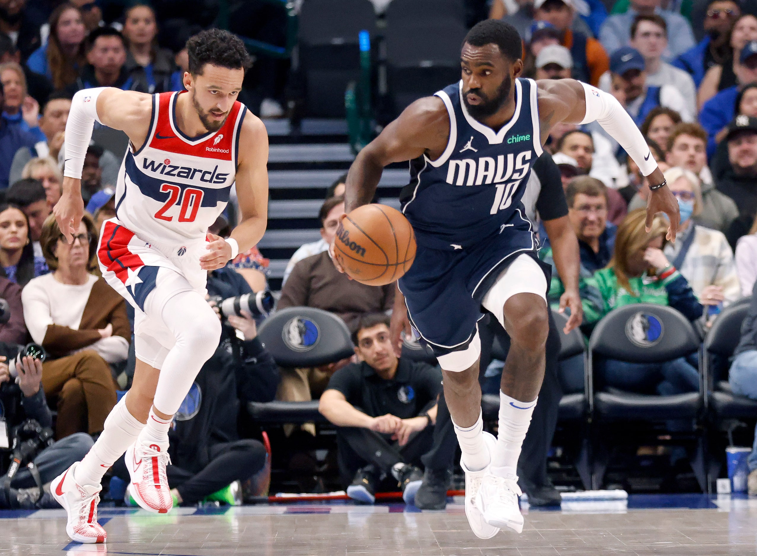 Dallas Mavericks forward Tim Hardaway Jr. (10) snags the ball and races down court during...