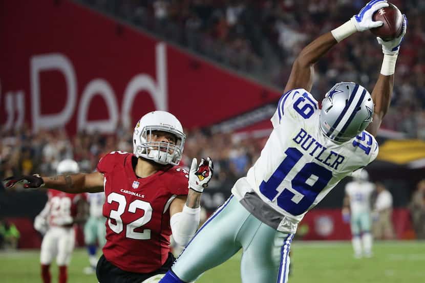 Dallas Cowboys wide receiver Brice Butler (19) catches a reception over Arizona Cardinals...