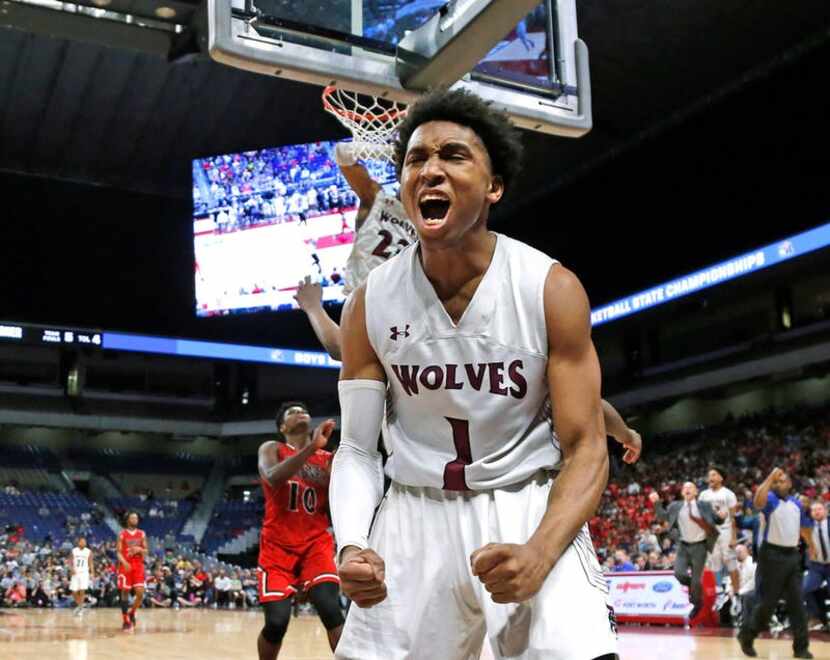 Mansfield Timberview's CJ Smith reacts after an and one. UIL boys basketball 5A State Final...
