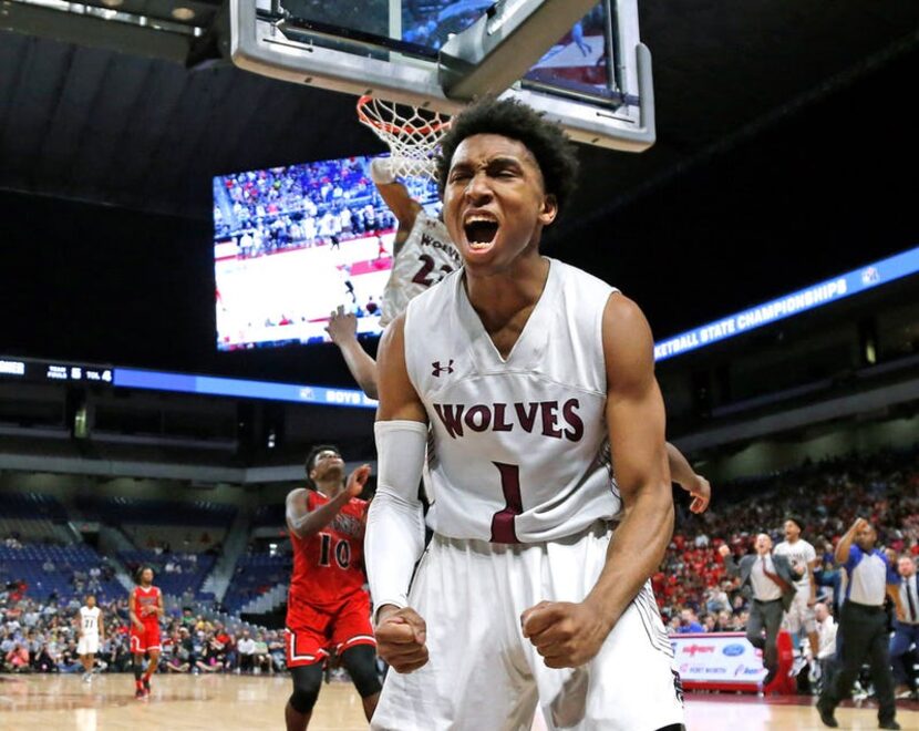 Mansfield Timberview's CJ Smith reacts after an and one. UIL boys basketball 5A State Final...