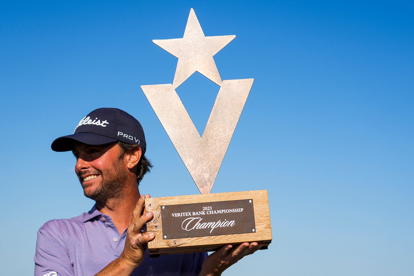 Spencer Levin holds the trophy after winning the Korn Ferry Tour Veritex Bank Championship...