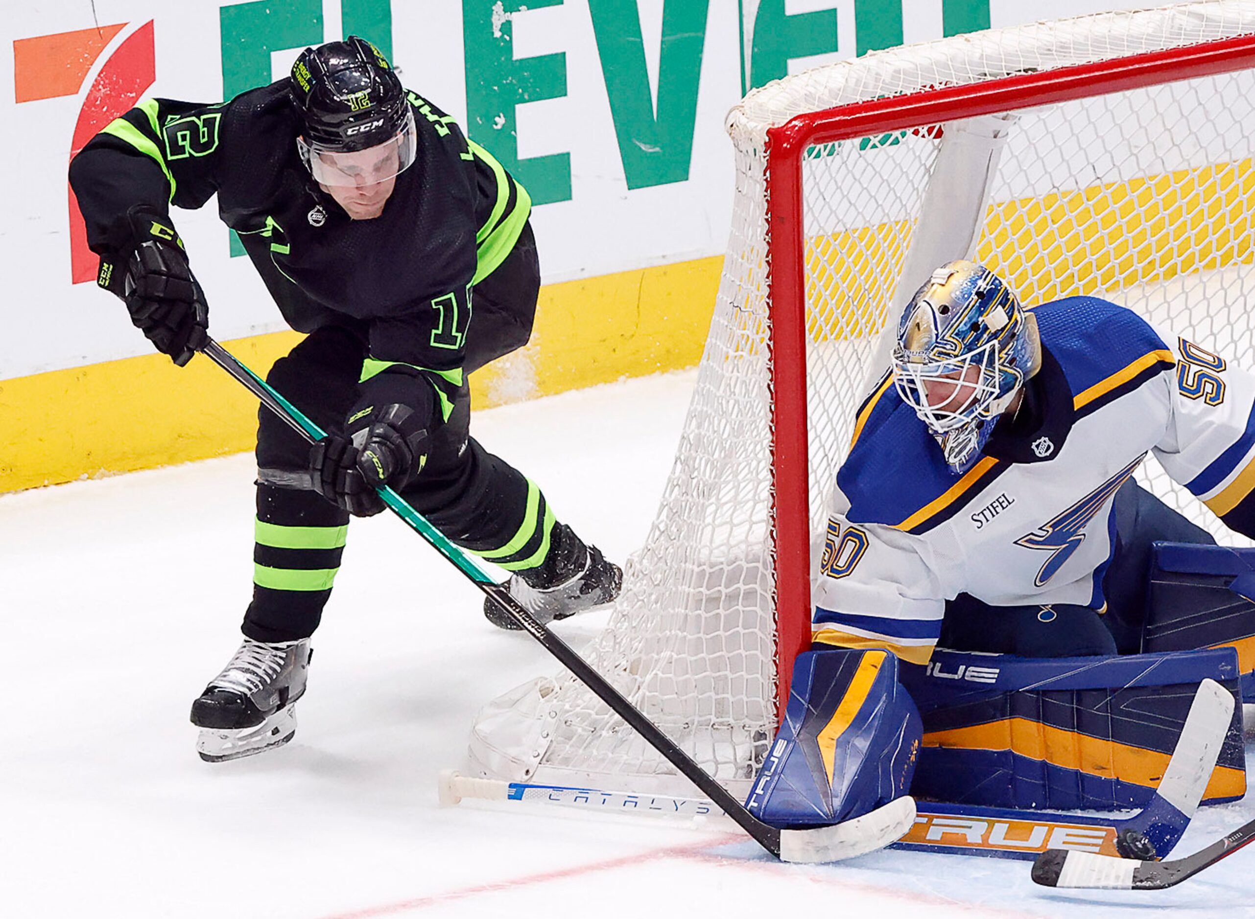 Dallas Stars center Radek Faksa (12) attempts the wrap around goal against St. Louis Blues...