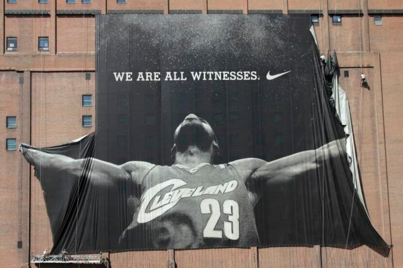 
In this photo from 2010, a 10-story banner of former Cleveland Cavaliers NBA basketball...