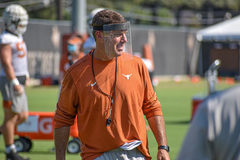 Texas defensive coordinator Chris Ash instructs his players during a practice before the...