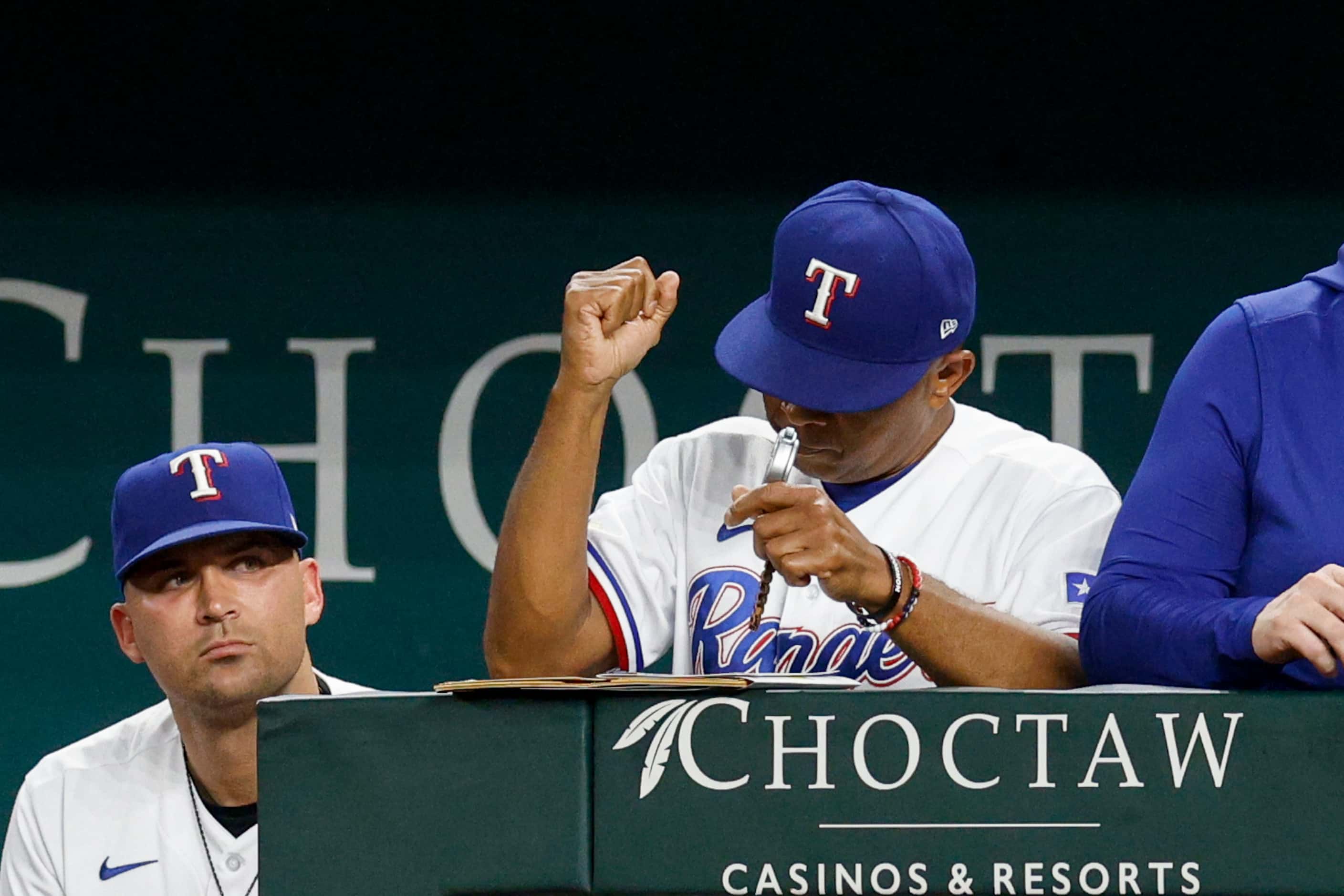 Texas Rangers interim manager Tony Beasley (27) pumps his fist after a game against the...