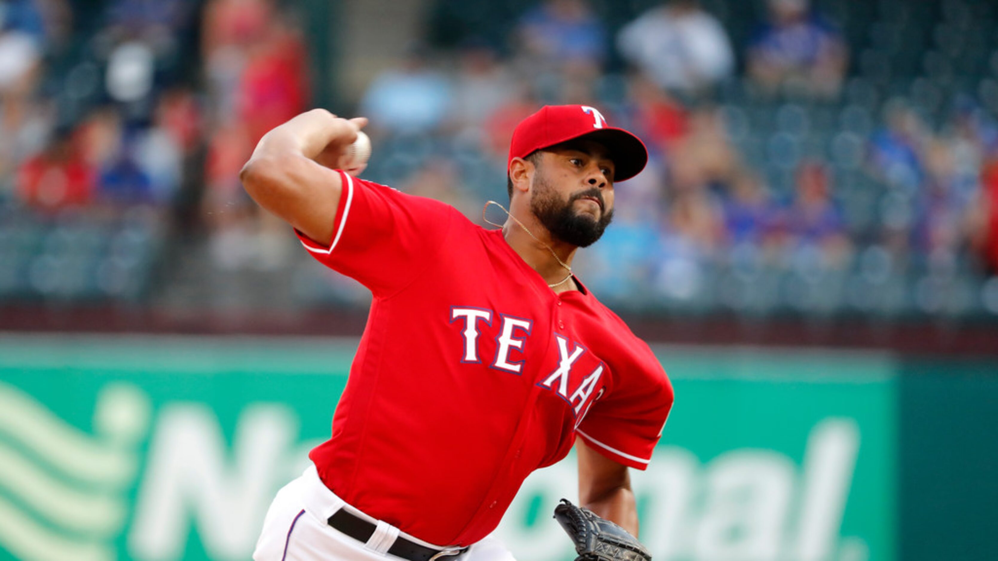 Texas Rangers pitcher Pedro Payano works against the Minnesota Twins in a baseball game in...