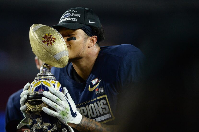 GLENDALE, AZ - DECEMBER 30: Safety Marcus Allen #2 of the Penn State Nittany Lions kisses...