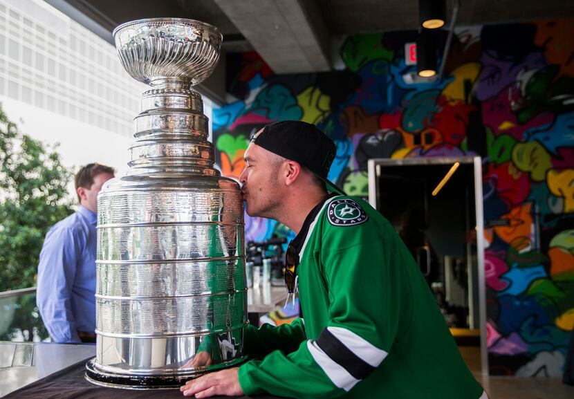 Drew Garison kissed the Stanley Cup at DIBS on VICTORY before Game 6 of the first round of...