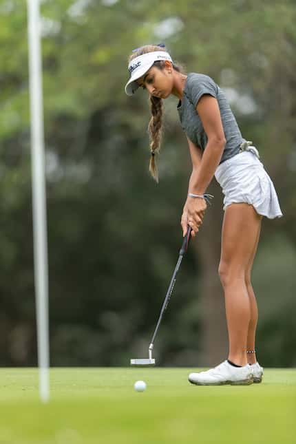 Lewisville Hebron's Symran Shah putts on the 1st green during round 2 of the UIL Class 5A...
