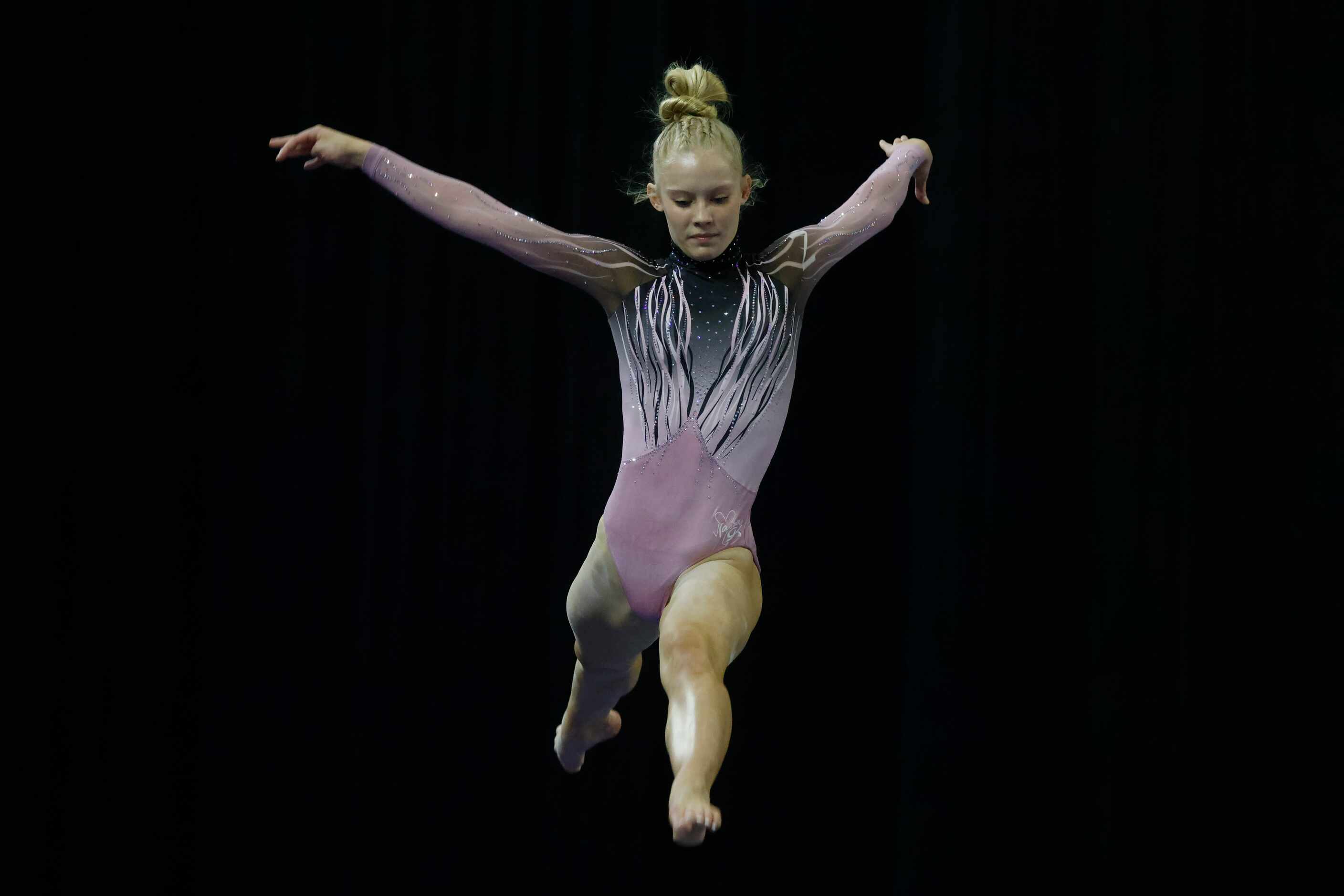 Kennedy Cochran of Gold Medal, Chandler, Arizona competes in balance beam during Nastia...