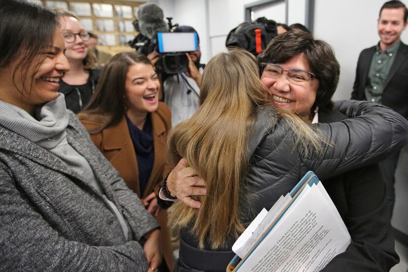 Former Dallas County Sheriff Lupe Valdez is hugged by well-wishers after her announcement...