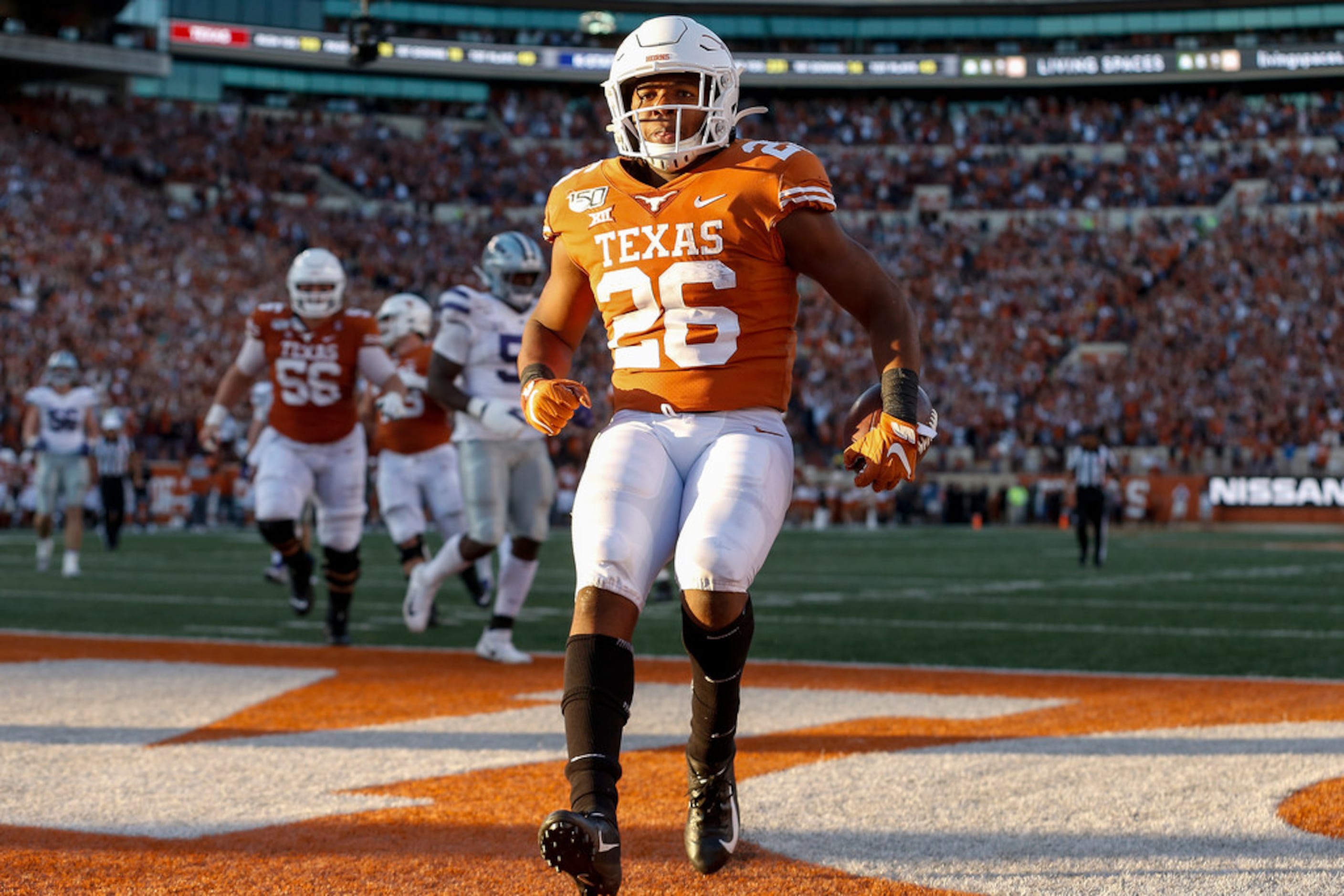 AUSTIN, TX - NOVEMBER 09:  Keaontay Ingram #26 of the Texas Longhorns rushes for a touchdown...