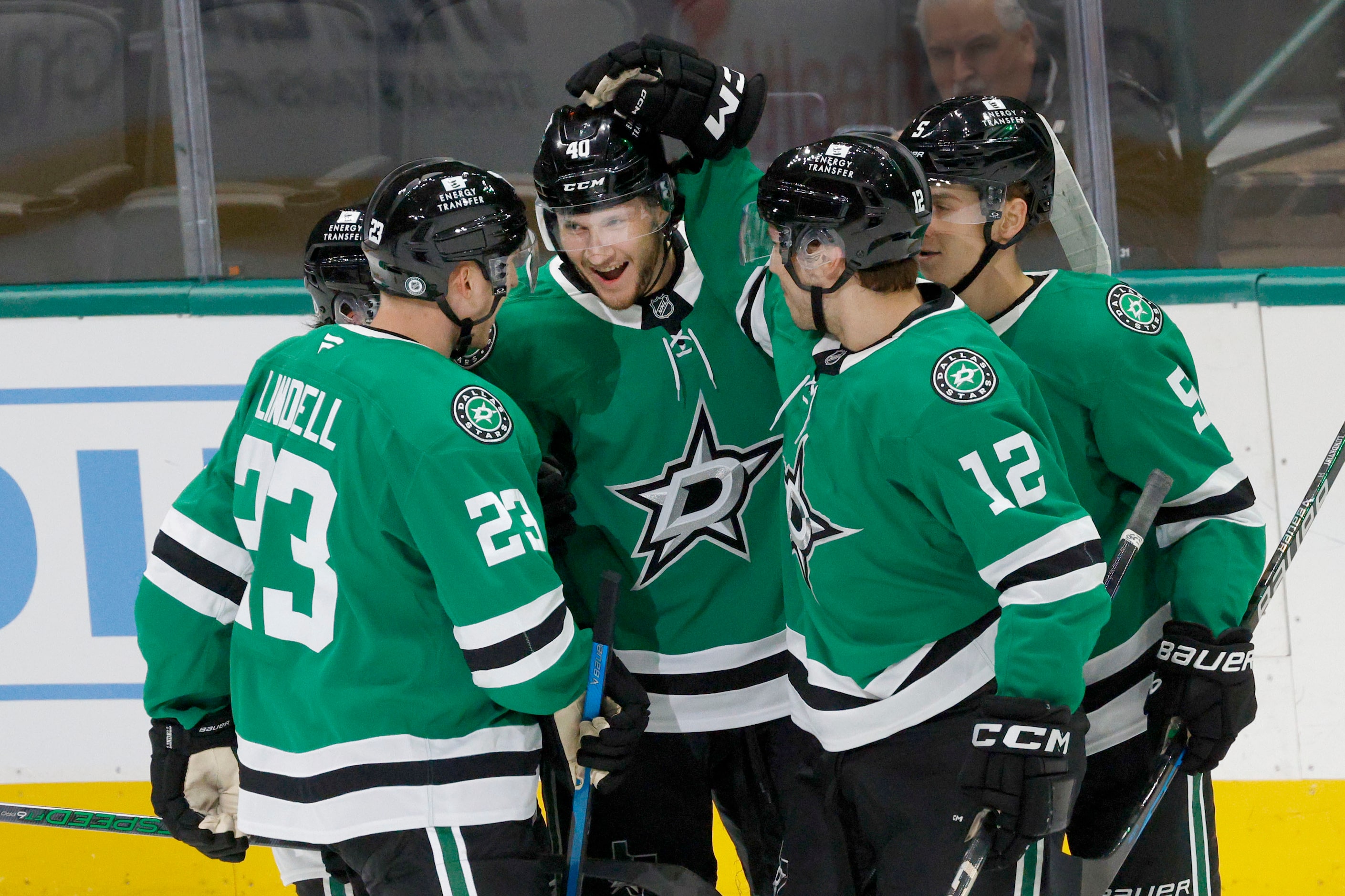 Dallas Stars right wing Kyle McDonald (40) celebrates with his teammates after scoring a...