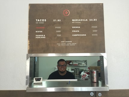 Luis Olvera, owner of Trompo, behind the counter of the taqueria's first brick-and-mortar...