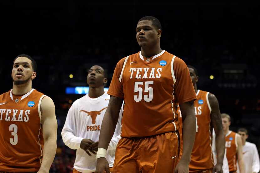 MILWAUKEE, WI - MARCH 22:  Javan Felix #3 and Cameron Ridley #55 of the Texas Longhorns...