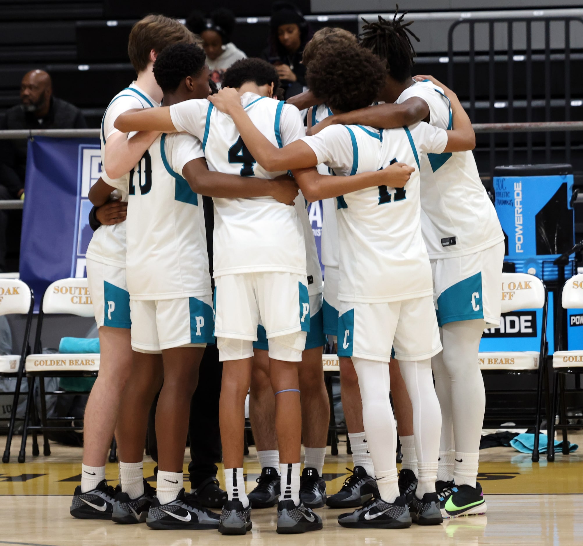 Frisco Panther Creek players huddle just before the start of their game against Dallas...