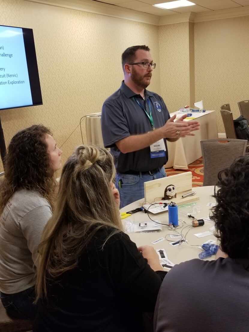 Liberty High School teacher Kenric Davies leads a workshop about using cartoons to teach...