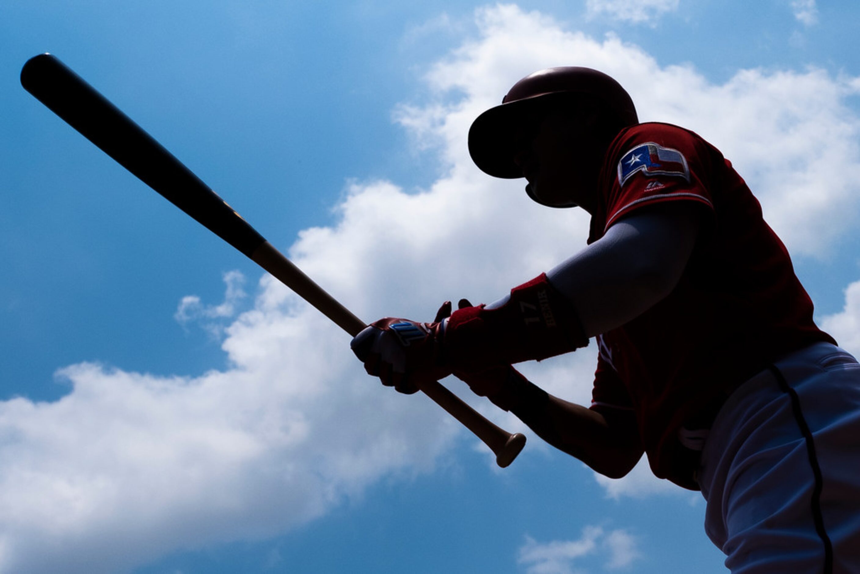 Texas Rangers left fielder Shin-Soo Choo heads to the batters box during the first inning...