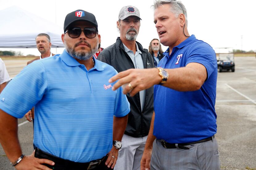 Texas Rangers Hall of Fame catcher Ivan 'Pudge' Rodriguez (left) and former Rangers pitcher...