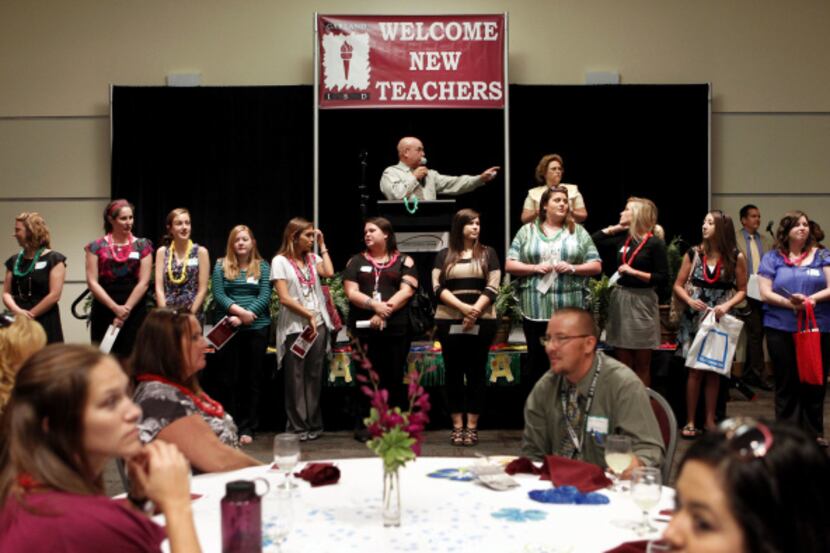 Keith Reimer (center) of Garland ISD welcomed the latest class of the Future Teacher...
