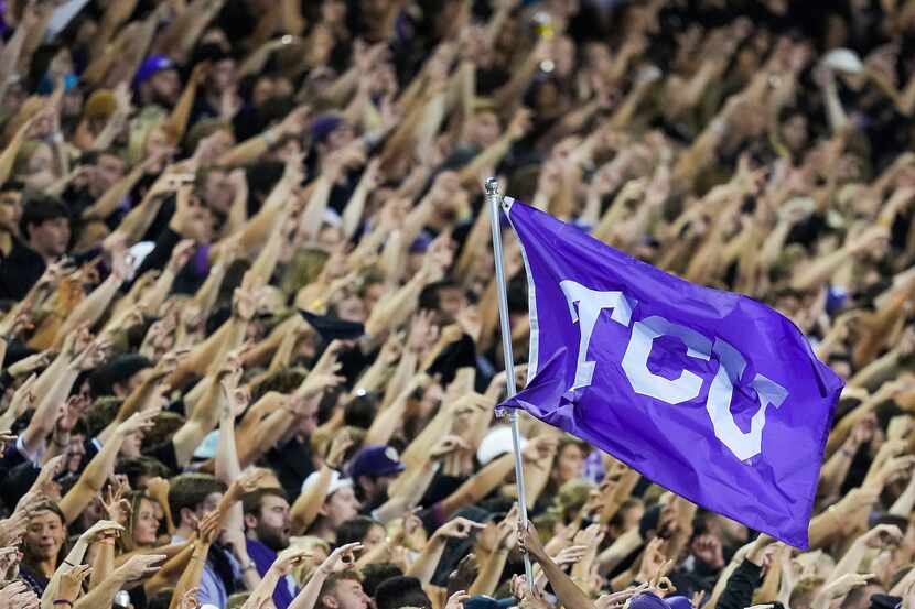 TCU fans cheer their team during the first half an NCAA football game against TCU on...