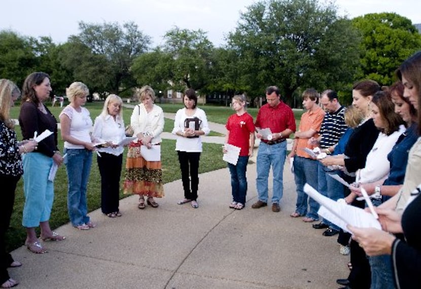 Friends and members of the Omega Chapter of the Zeta Tau Alpha sorority meet for an...