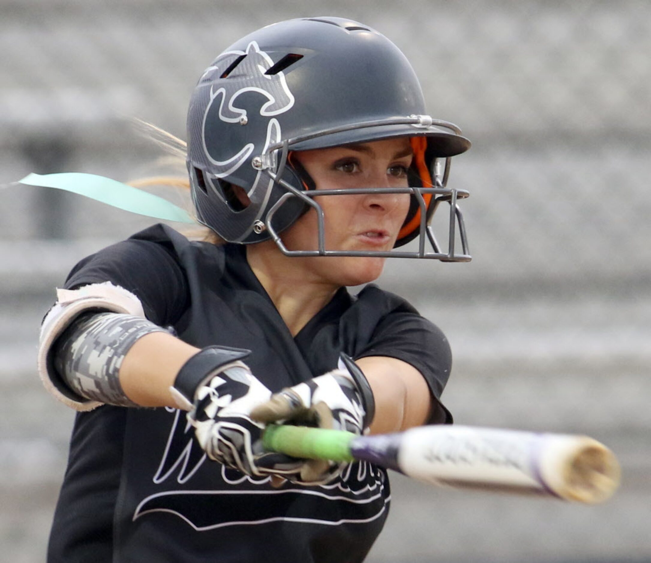 Denton Guyer outfielder Hannah Hodapp (3) watches as her long drive to right field quickly...