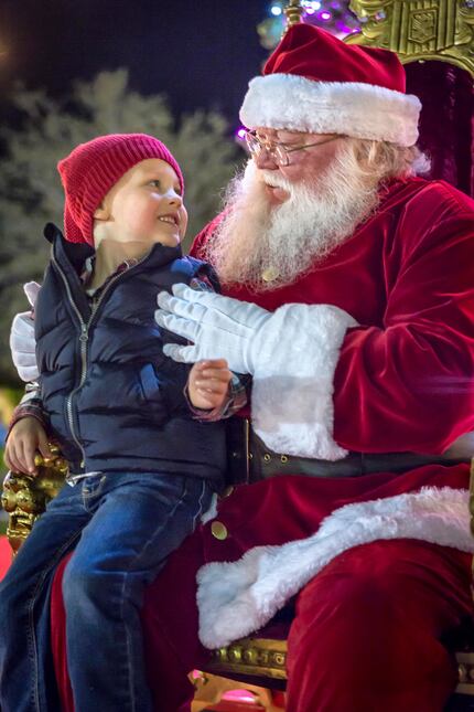Jack O'Brien, 4, visits with Santa at Peppermint Park.