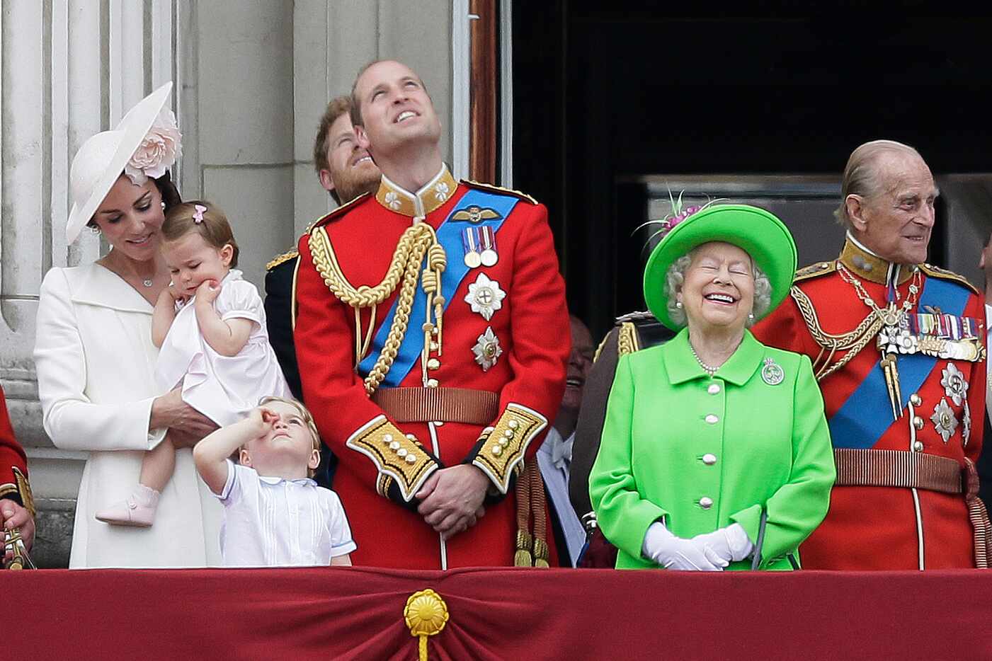 One-year-old Princess Charlotte joined big bother George on the balcony for the queen's...