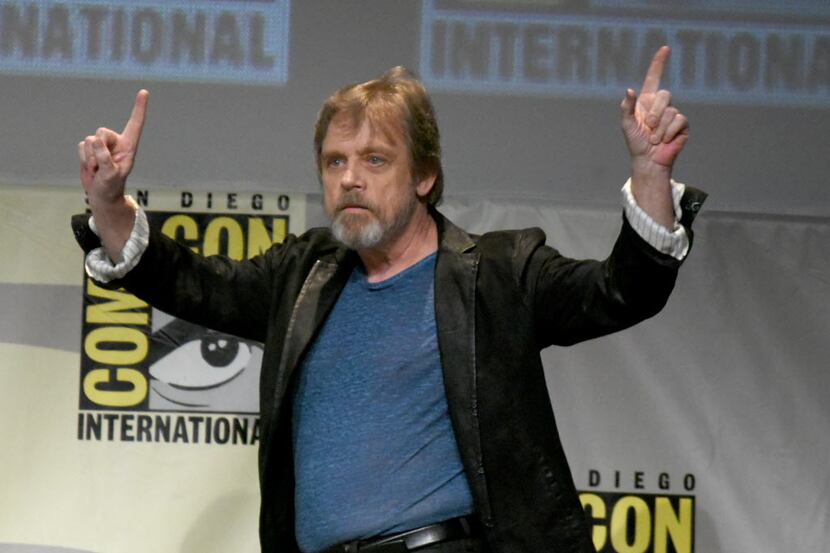 Mark Hamill walks onstage at Lucasfilm's "Star Wars: The Force Awakens" panel on day 2 of...