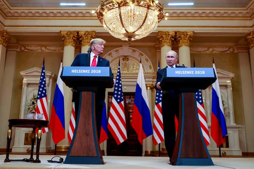 President Donald Trump  and President Vladimir Putin of Russia appear at a joint news...