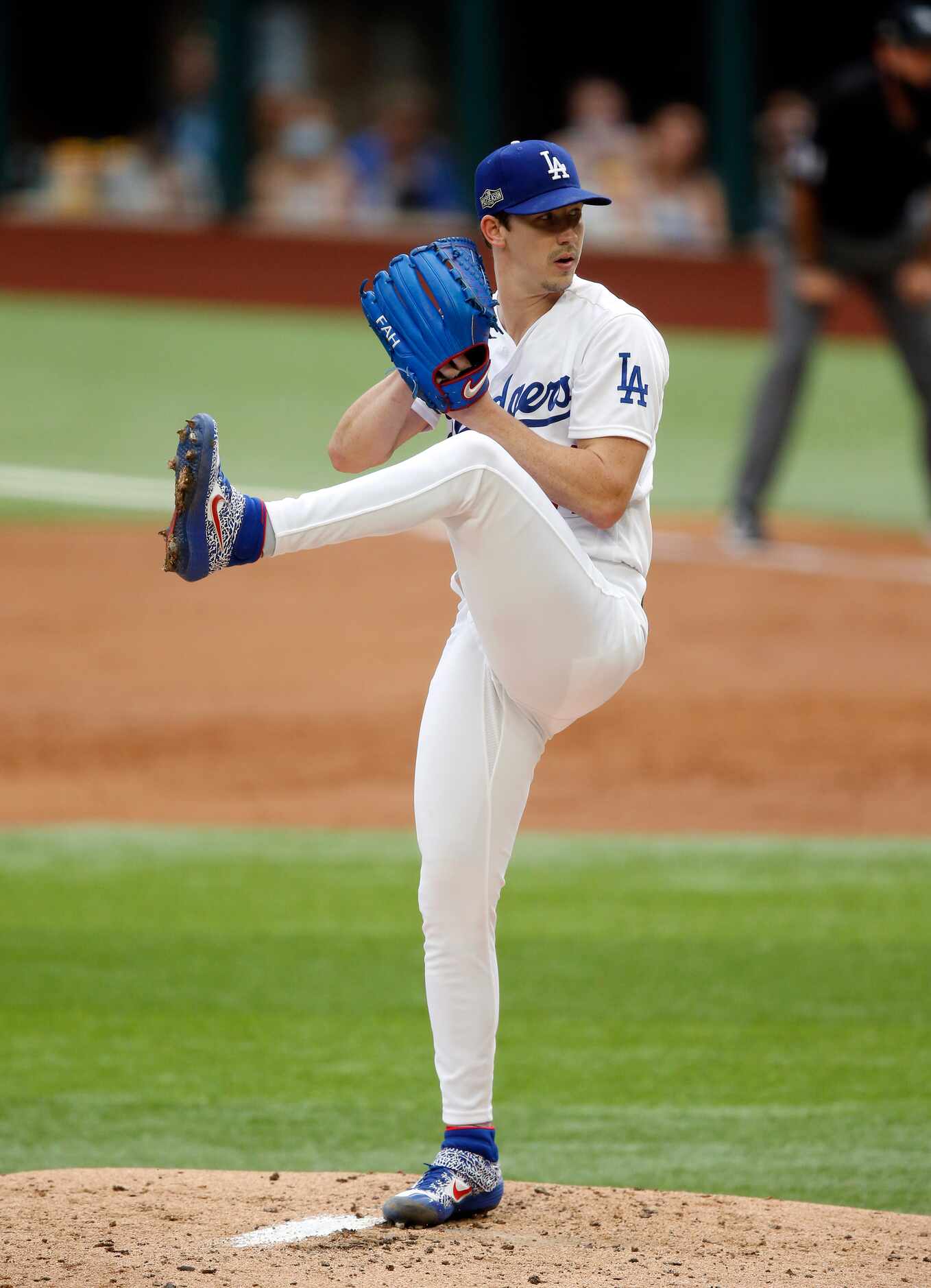 Los Angeles Dodgers starting pitcher Walker Buehler (21) throws against the Atlanta Braves...