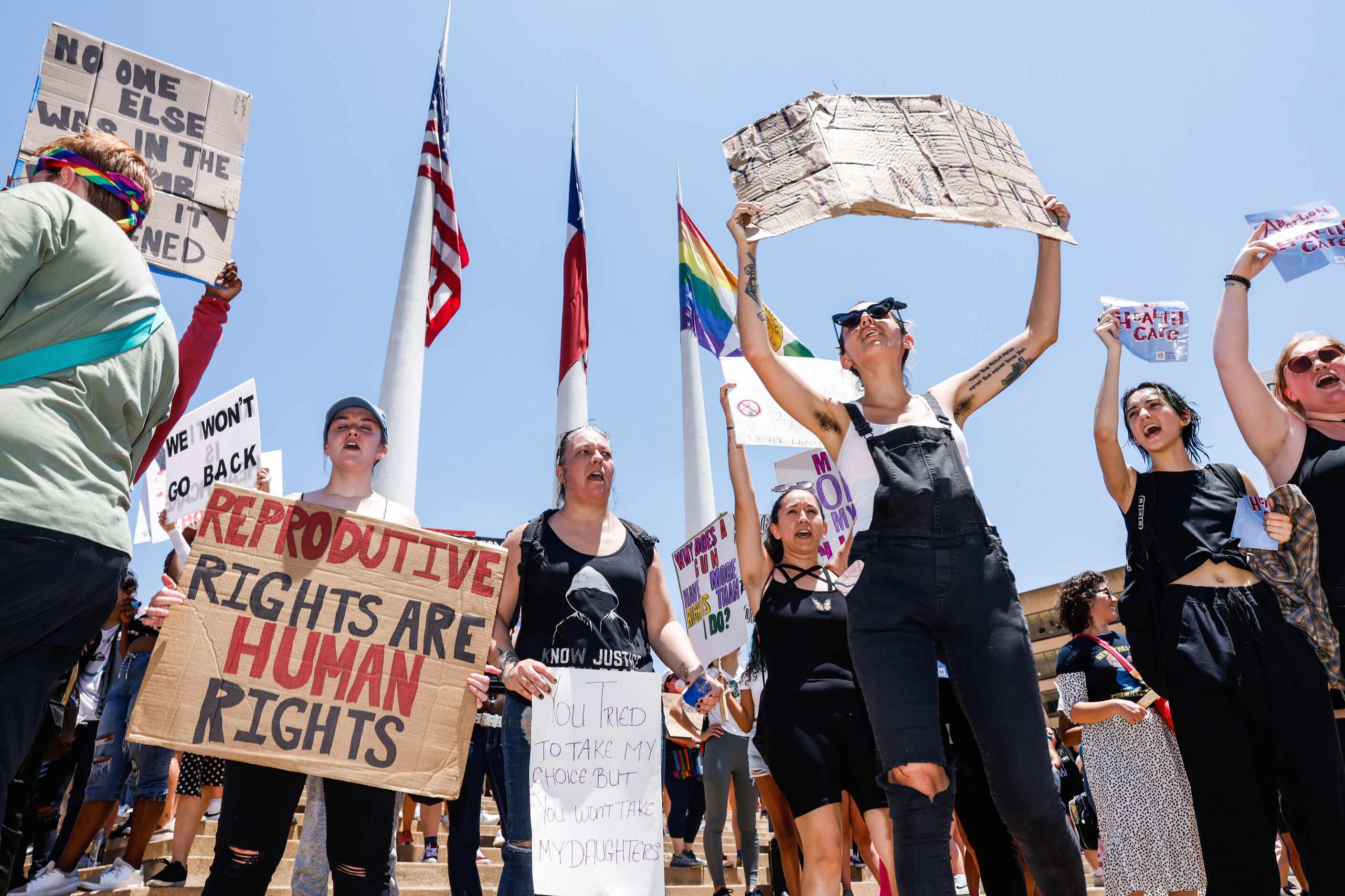 Abortion rights supporters gather at the Dallas City Hall after marching in downtown Dallas...