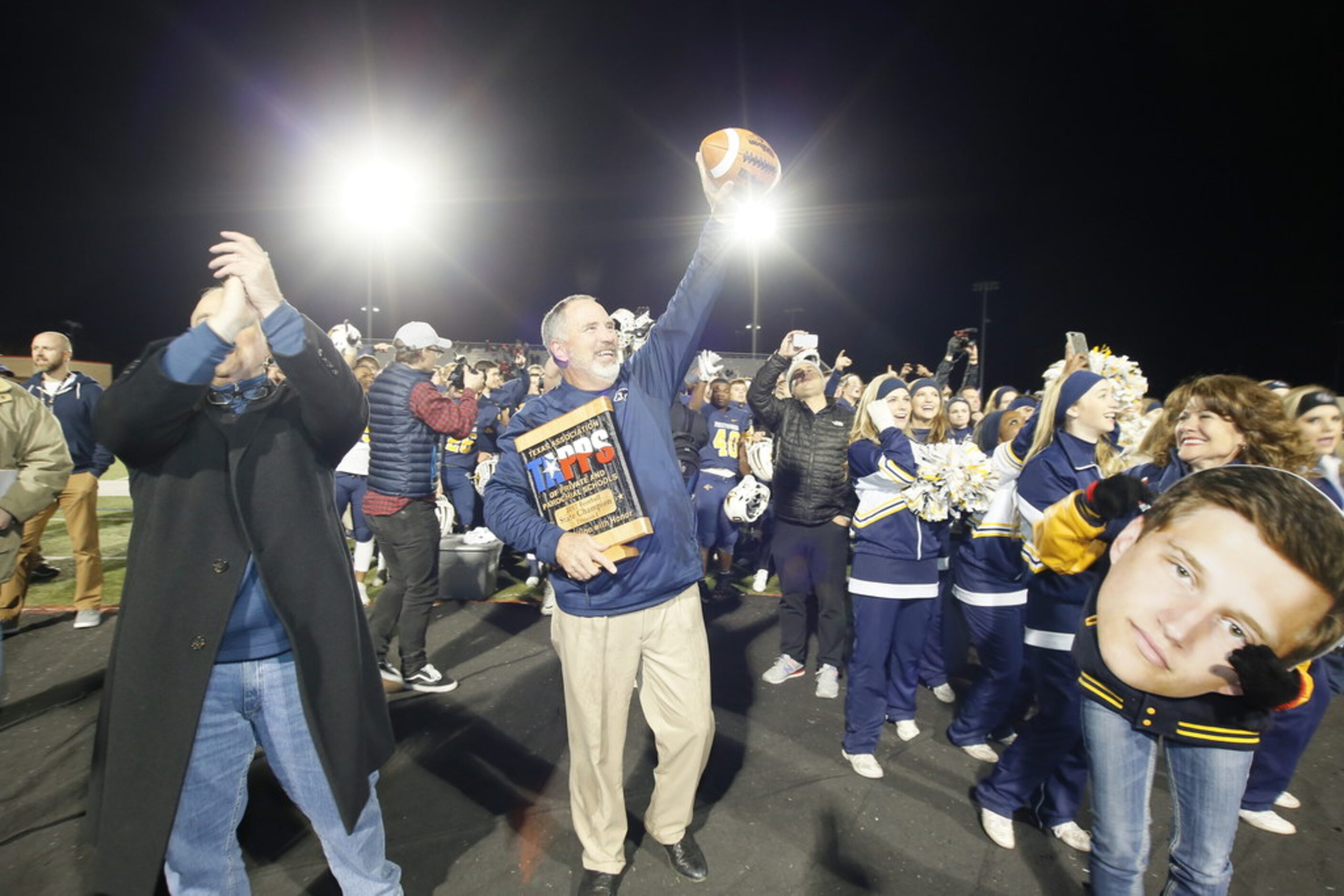 Prestonwood Christian Academy Head coach Chris Cunningham  celebrates after winning the...