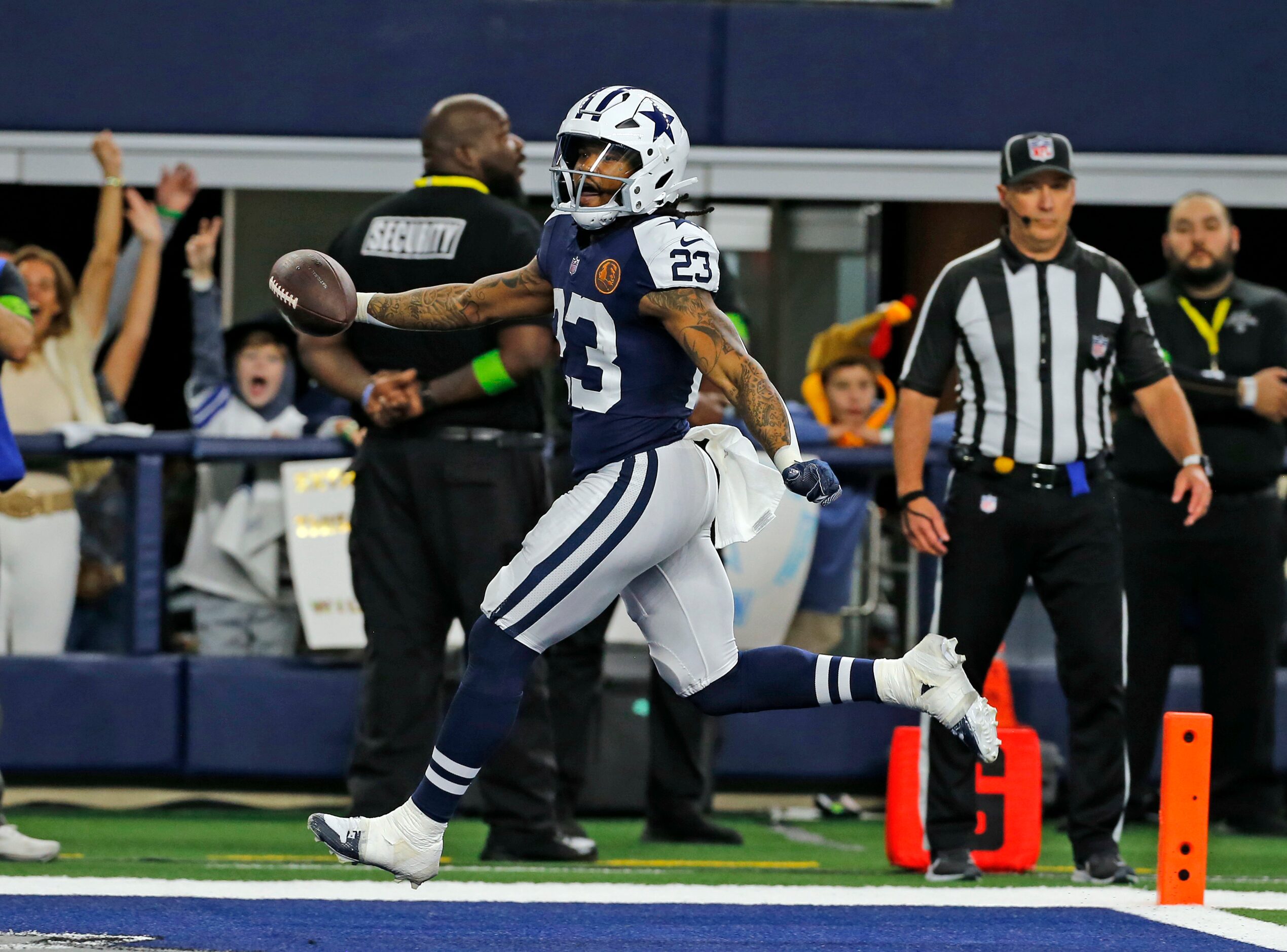 Dallas Cowboys running back Rico Dowdle (23) crosses the goalie for a touchdown during the...