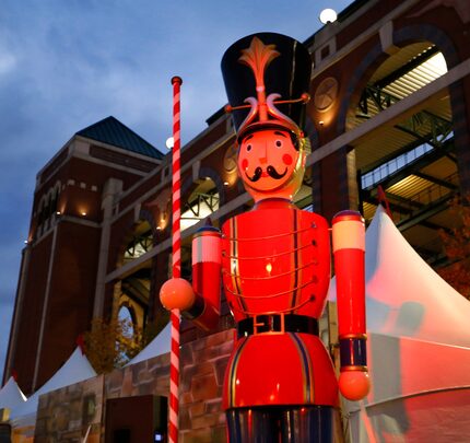 Large nutcrackers adorn the shops along the Texas Christkindl Market outside Globe Life Park...