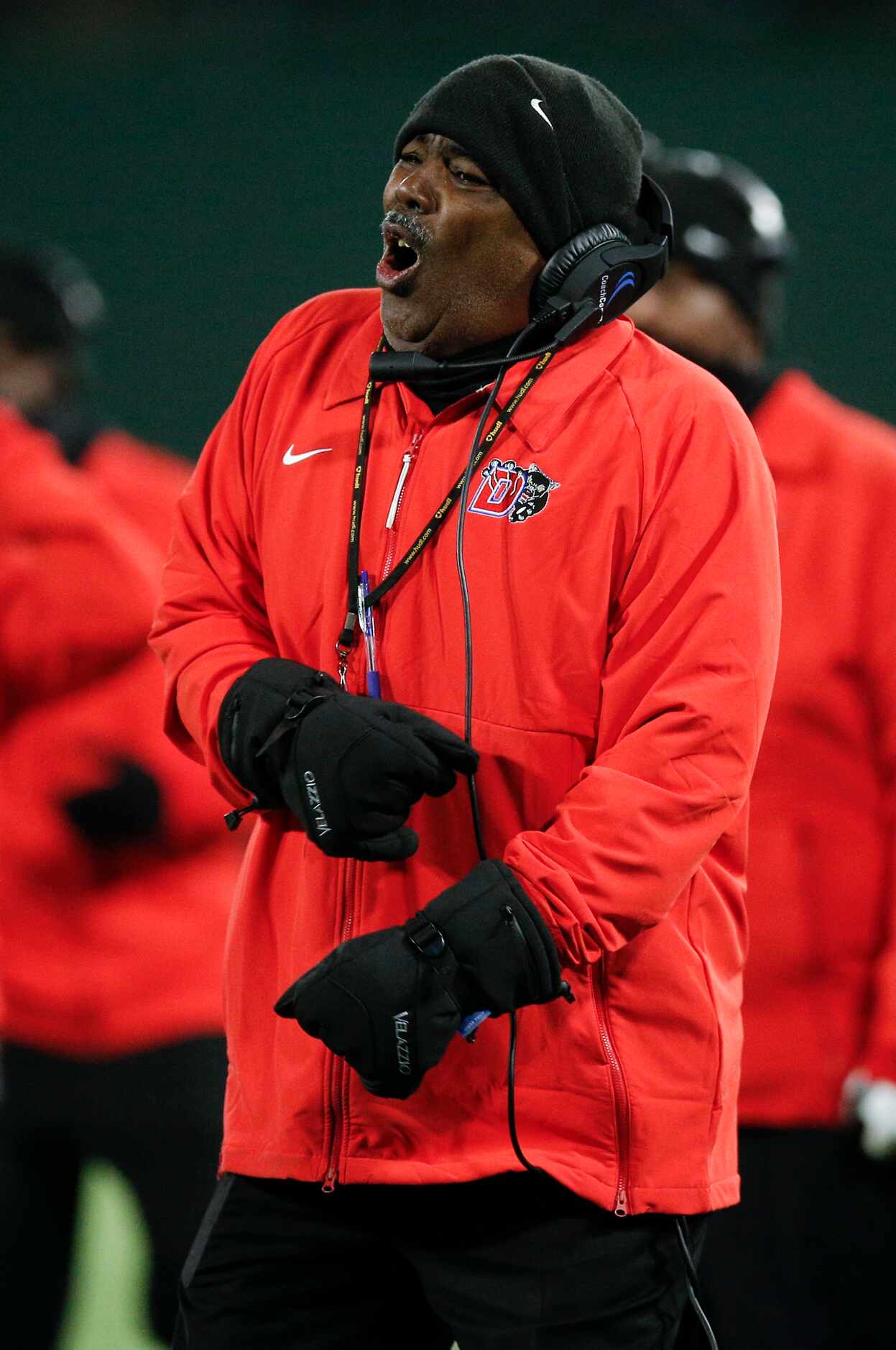 Duncanville head coach Reginald Samples argues for a call during the first half of a Class...