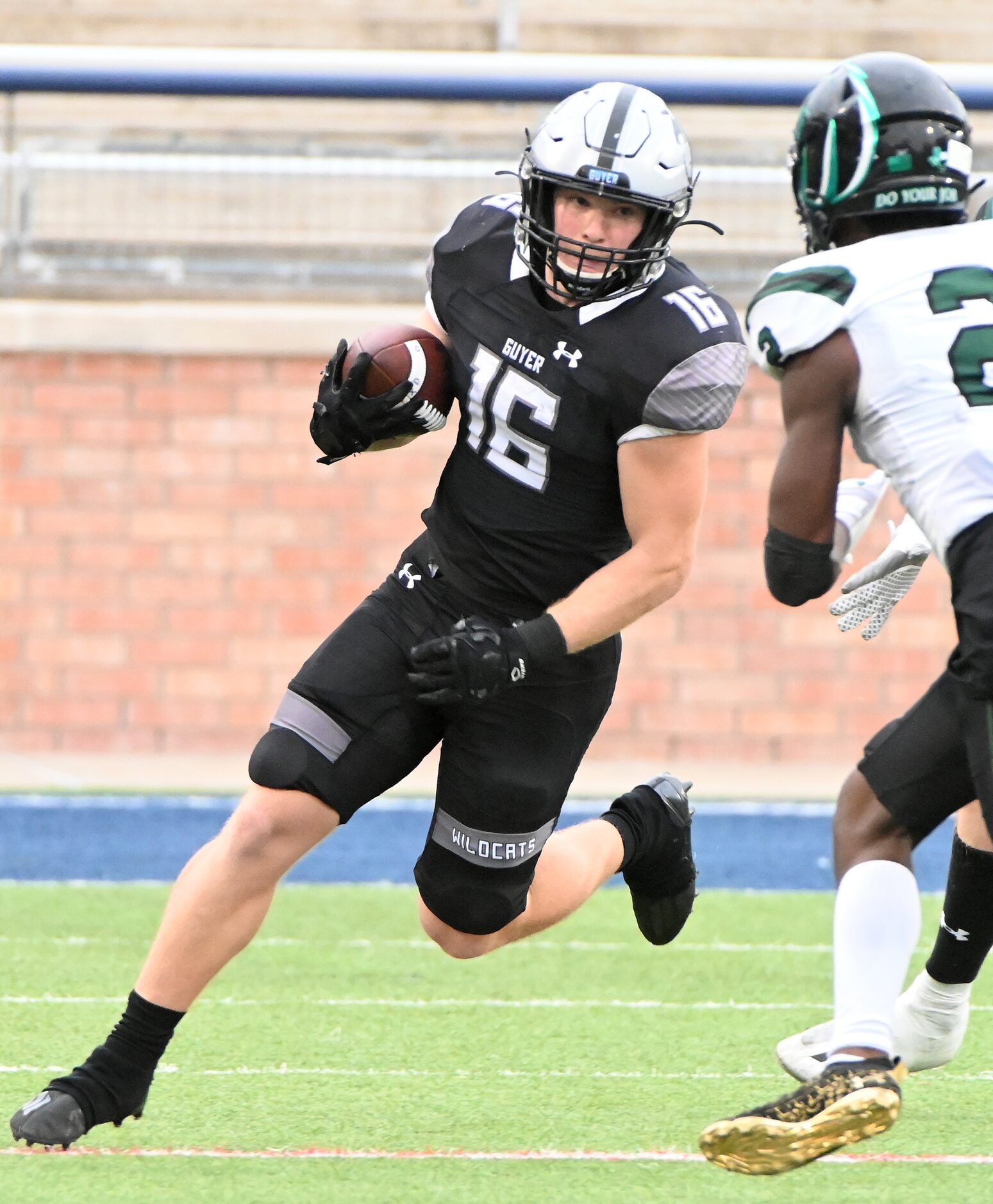 Denton Guyer's Jackson Foster (16) runs upfield on Prosper’s Kaleb Miles (2) in the second...