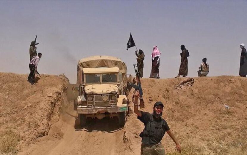 An image from a jihadist Twitter account shows what it says are militants on a road from...