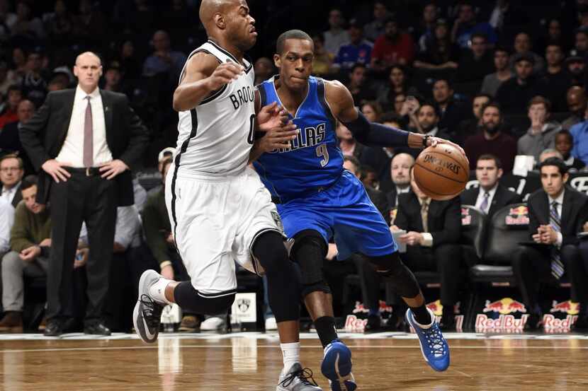 Dallas Mavericks guard Rajon Rondo (9) drives the ball against Brooklyn Nets guard Jarrett...