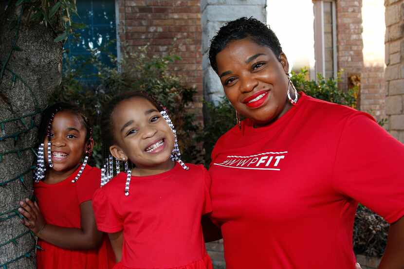 United States Army veteran LaNeika Johnson, shown with her 5-year-old daughters Laiya, left,...