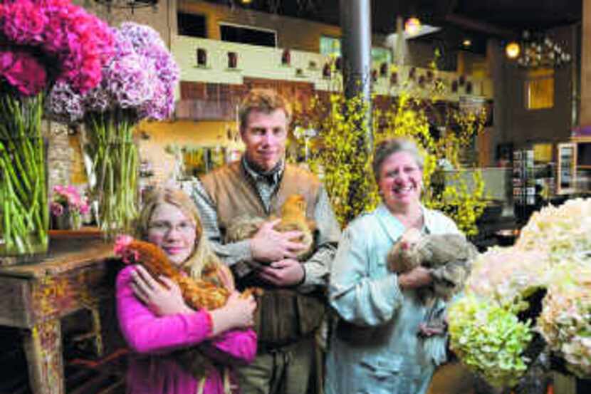  Luit and Jamie Huizenga's flagship Cebolla Fine Floral Emporium , near Maple and Inwood, is...