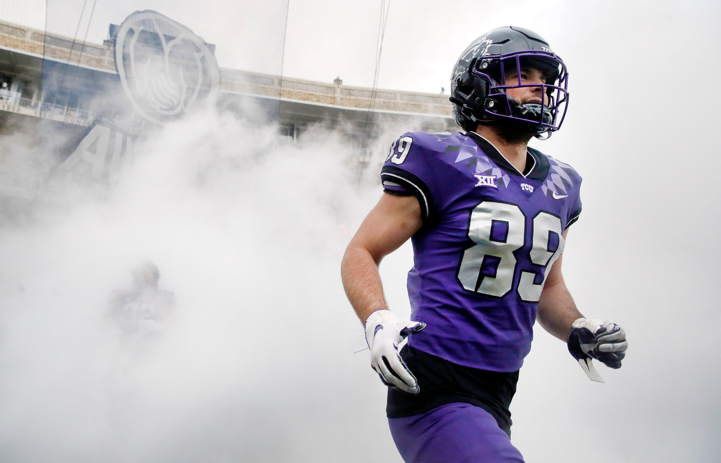 TCU Horned Frogs wide receiver Stayton Ankrom (89) takes the field in fog as the team faces...