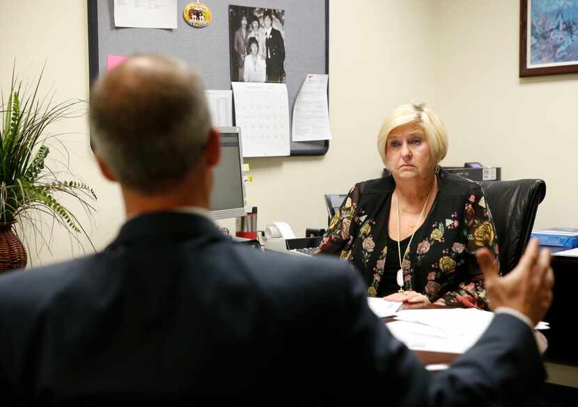 Attorney Dan Tobin talked with accounting manager Pam Eaton in her office at SettlePou in 2018.