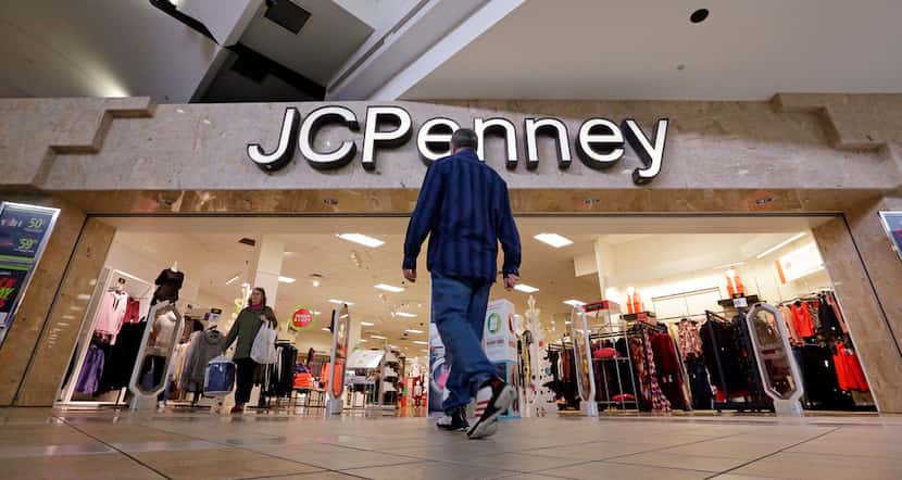 A shopper heads into a J.C. Penney store in Seattle The Plano-based company recorded a tax...