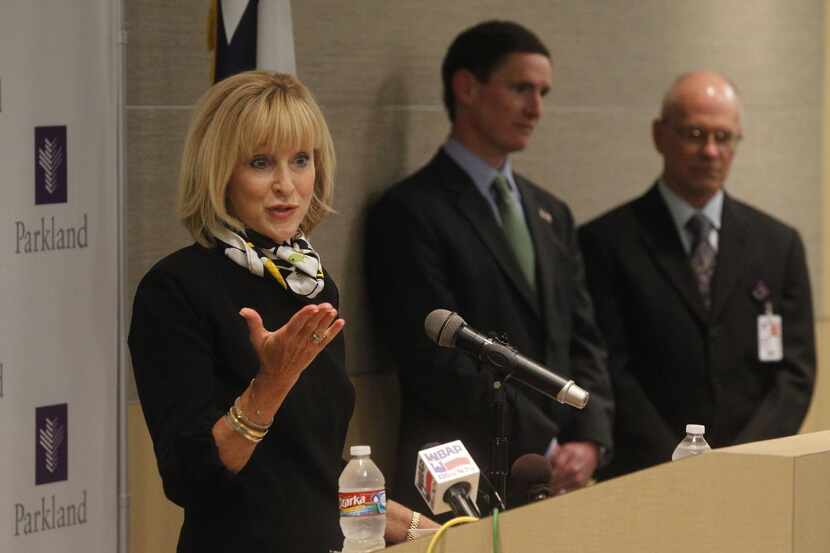 
Parkland board chairwoman Debbie Branson is shown with Dallas County Judge Clay Jenkins and...