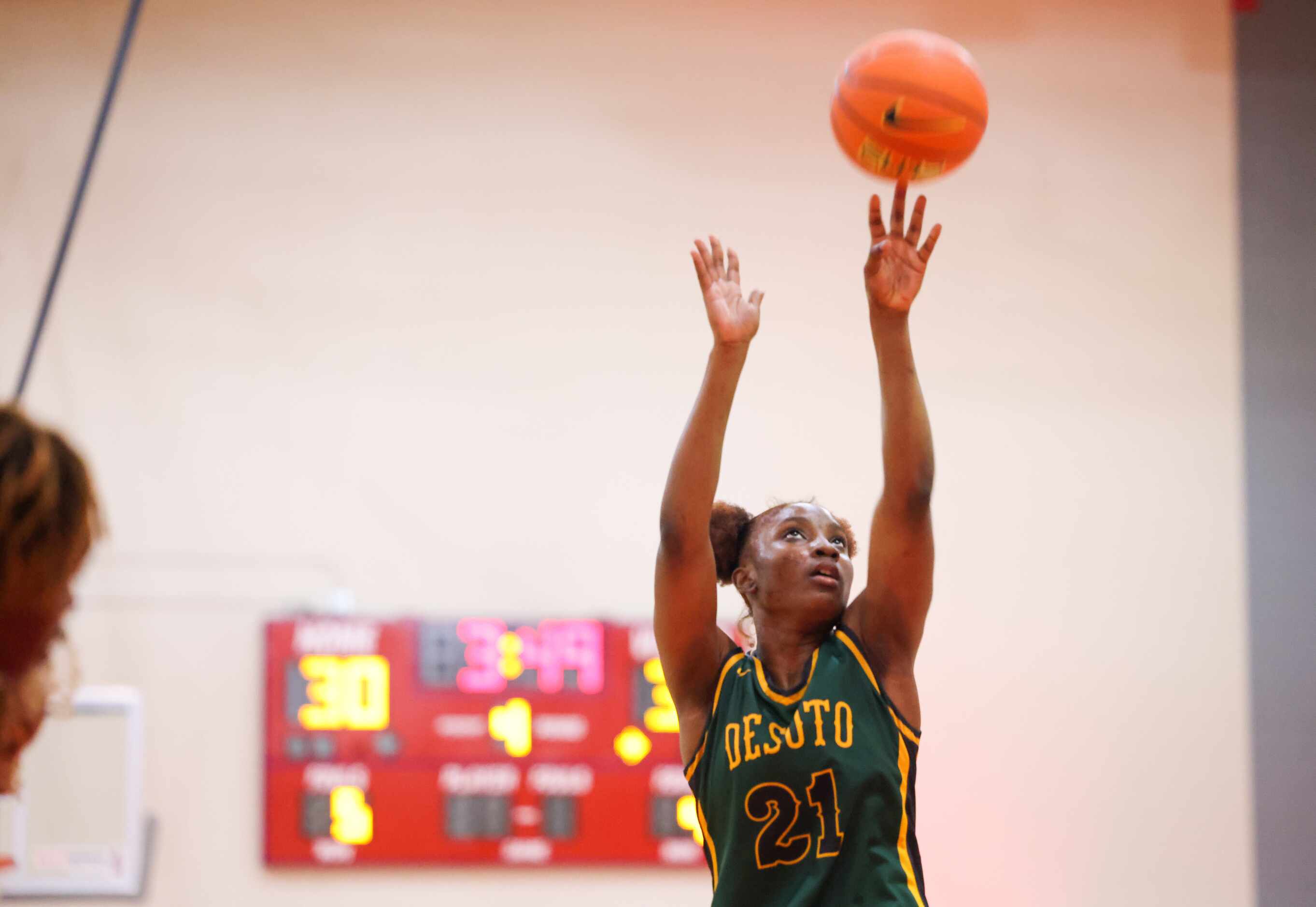 DeSoto shooting guard MaRiya Vincent (21) takes a free throw in the second half of a game...