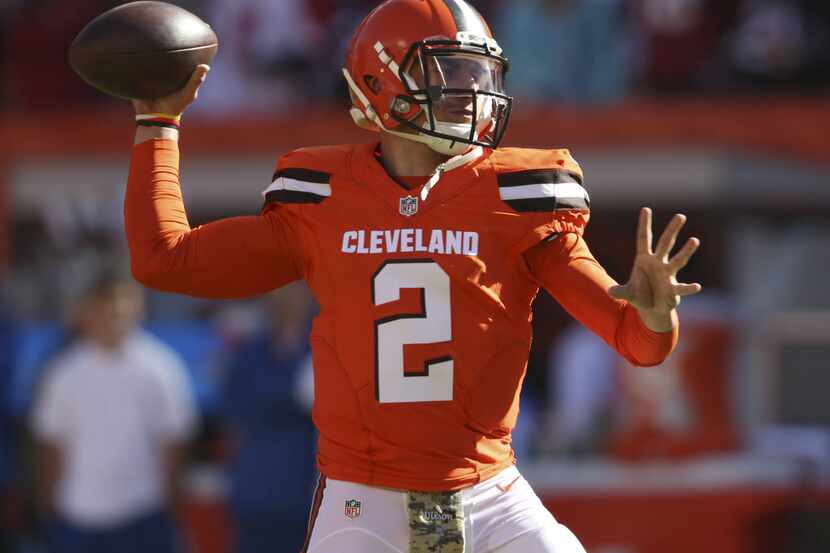 Cleveland Browns quarterback Johnny Manziel warms up before an NFL football game between the...